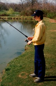 Young Zeke casts a line in Brownsville Pond.