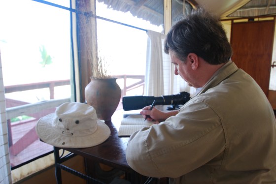 Zeke taking a moment to keep some of his adventures in Tanzania